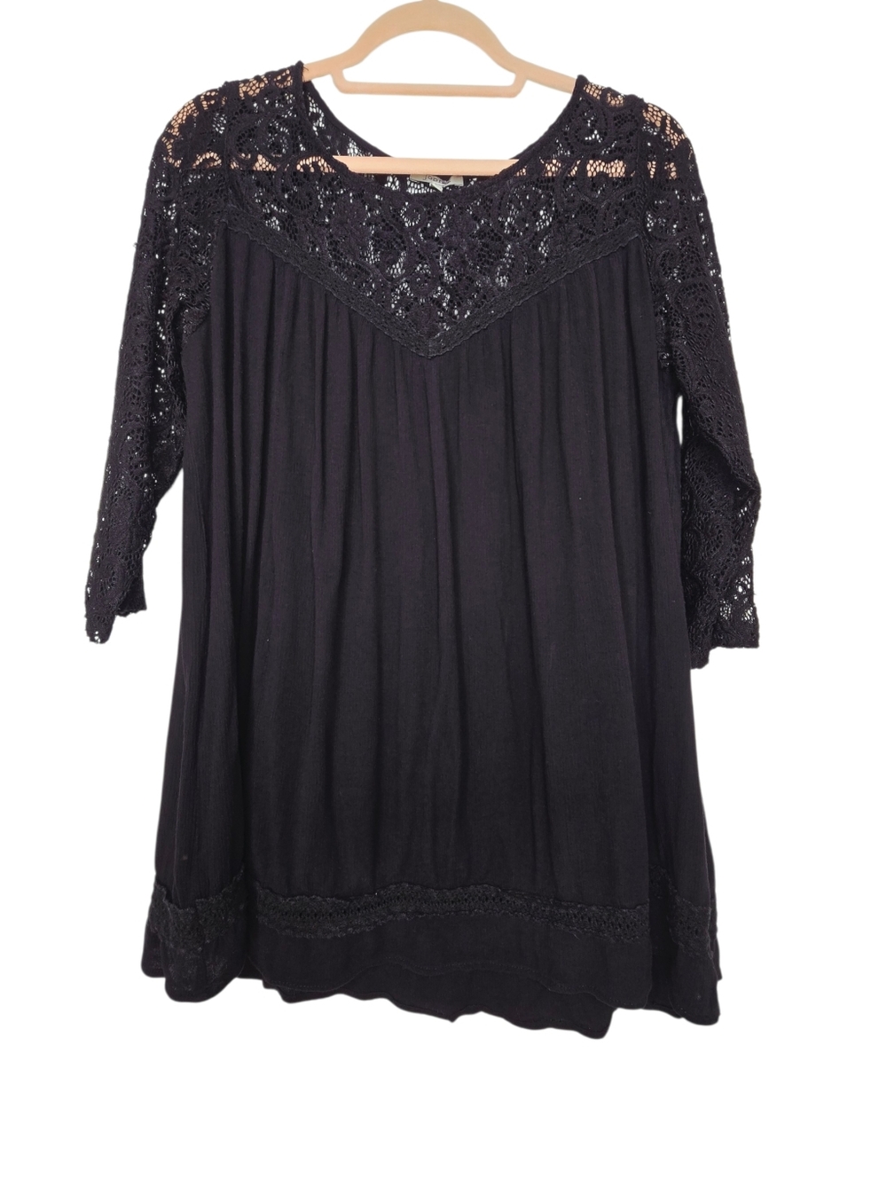 Jodifl black blouse features delicate lace detailing at the neckline and sleeves